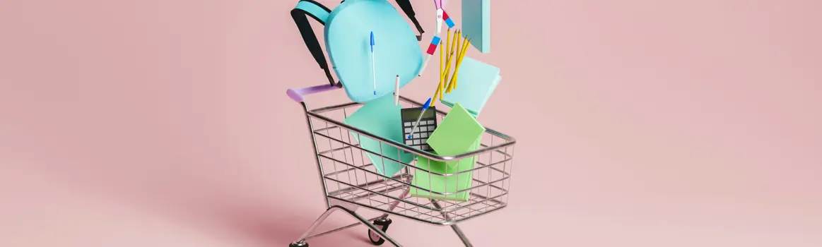 Animatische weergave van boodschappenkar met laptop, tas, schaar, notitieboek